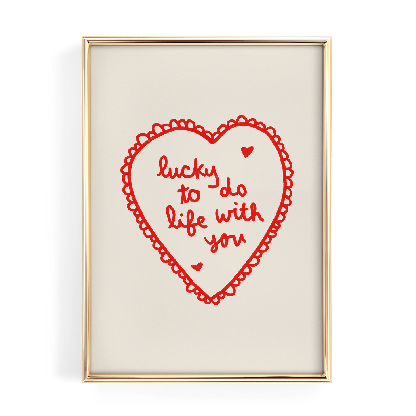 a heart-shaped graphic with the text "lucky to do life with you" written inside it.