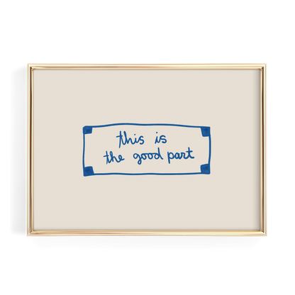 a simple, minimalist design with a gold frame and a white background. The main element is a blue rectangle with the handwritten text "This is the good part" written in blue.