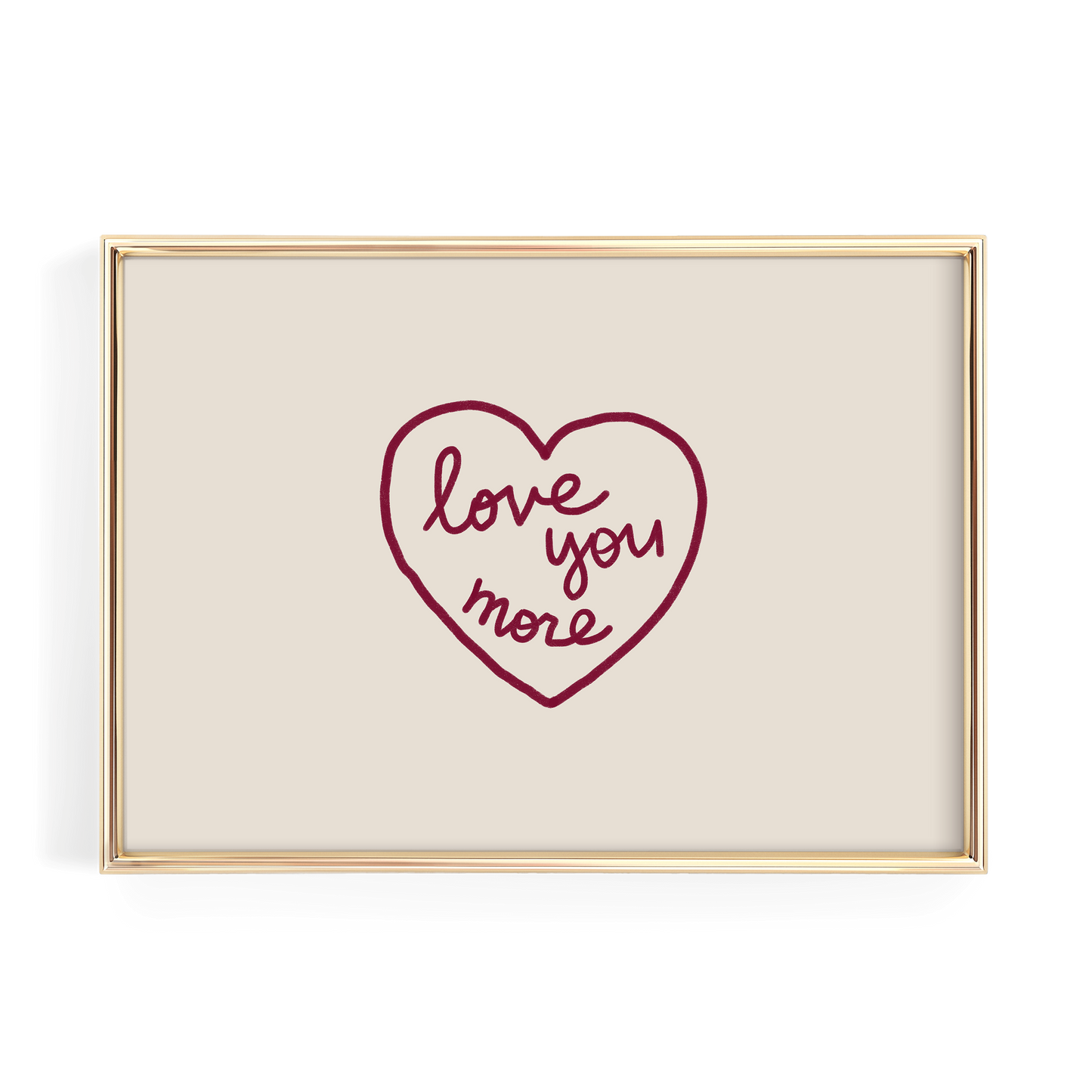 A framed image with a heart-shaped design containing the text "love you more" written in cursive.
