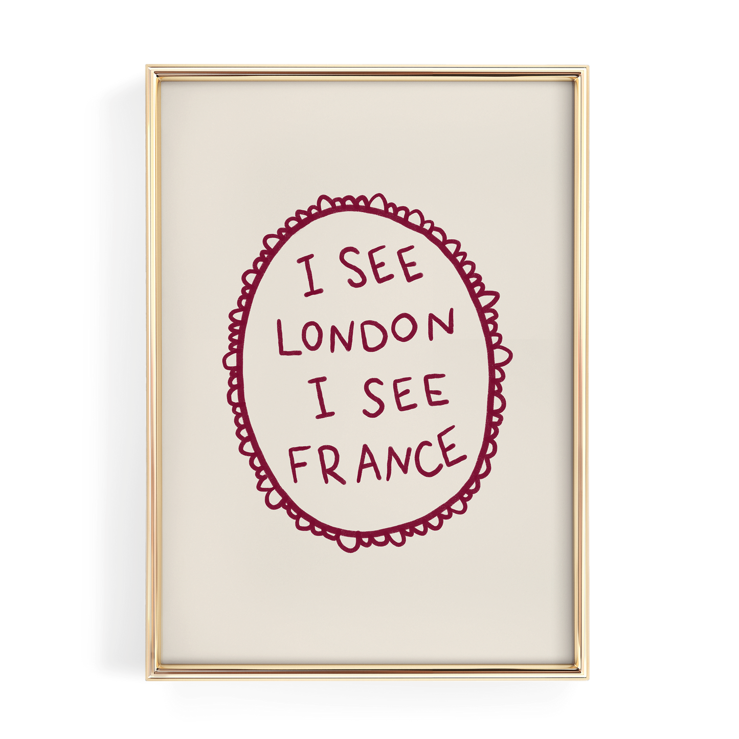 a framed piece of art with the text "I see London I see France" written in a decorative oval frame.