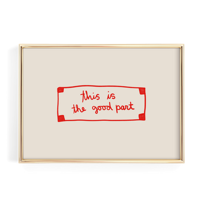 a simple, minimalist design with a gold frame and a white background. The main element is a red rectangle with the text "This is the good part" written in a handwritten style.