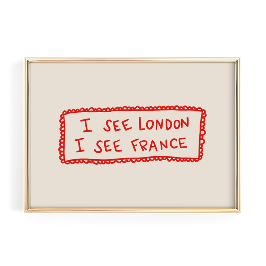 a framed text that says "I see London I see France" in red and white.