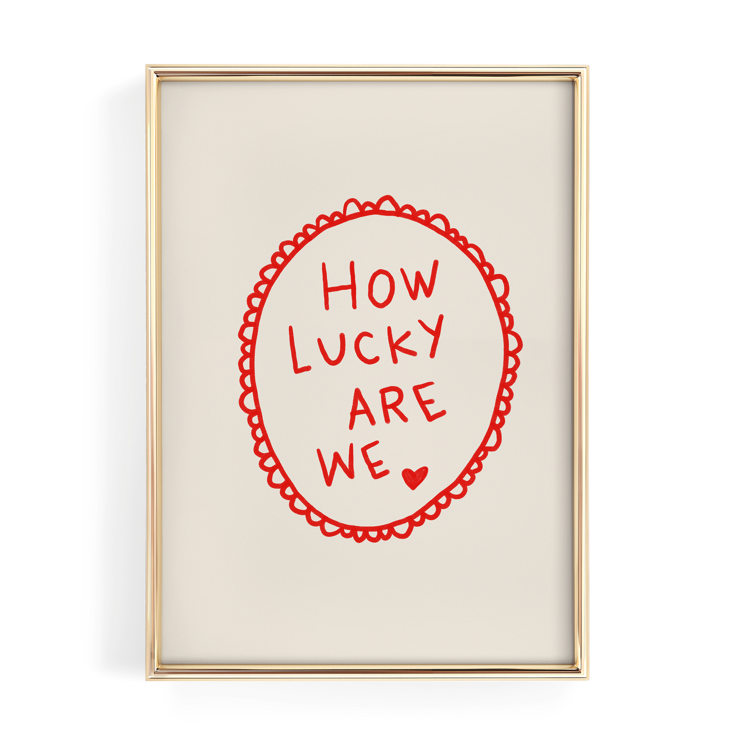 a framed piece of art with the text "HOW LUCKY ARE WE" written in a red circular design.